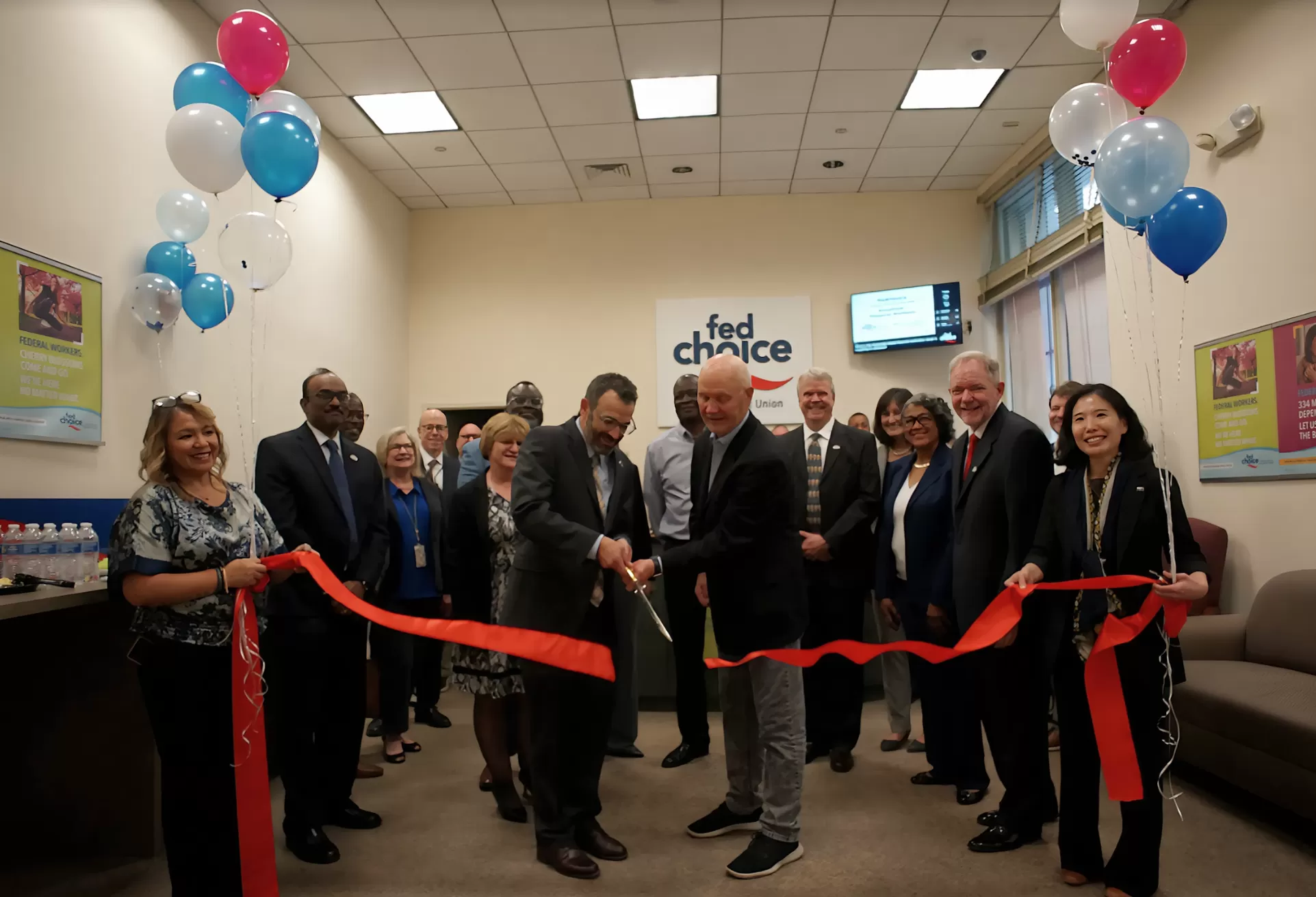 people enjoying the FedChoice opening ceremony ribbon cutting